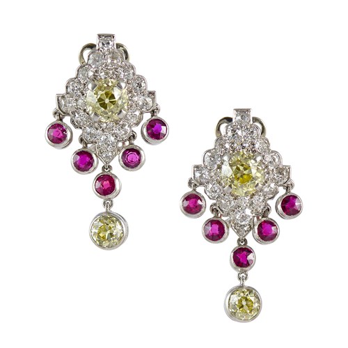 Pair of Art Deco yellow and white diamond cluster and ruby fringe earrings, c.1925, formed of a lozenge shaped cluster centred by an old cut yellow diamond,